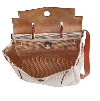 Lot 51 - An Hermès vache leather and natural toile canvas Herbag 2-in-1, 2003