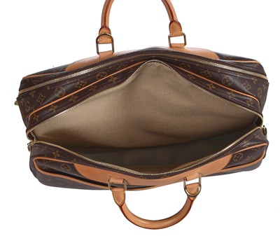 Lot 52 - A Louis Vuitton monogrammed canvas Alizé travel bag, 2006