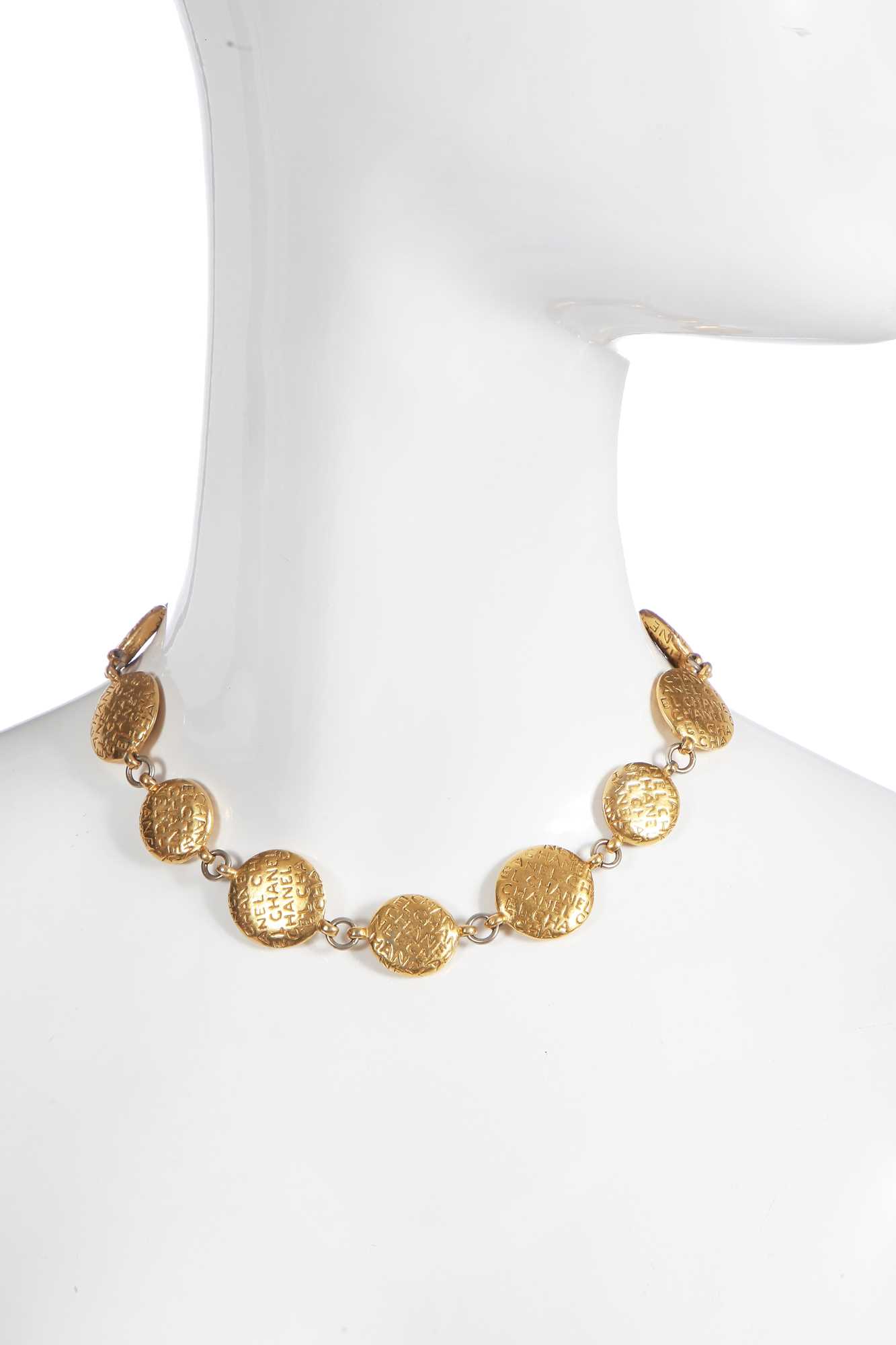 Lot 33 - A Chanel gold-tone coin necklace, circa 1990