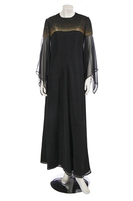 Lot 694 - A Christian Dior London by Jorn Langberg beaded black chiffon evening gown, circa 1970