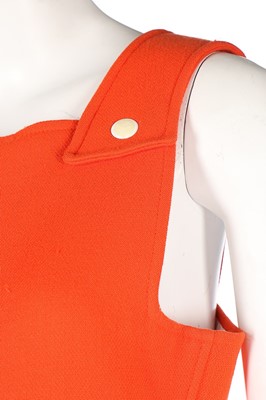 Lot 177 - A Courrèges orange wool pinafore-style dress,...