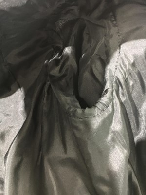 Lot 391 - A Givenchy haute couture black silk gazar coat, Spring-Summer 1972
