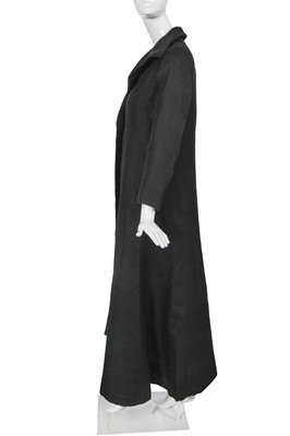 Lot 391 - A Givenchy haute couture black silk gazar coat, Spring-Summer 1972