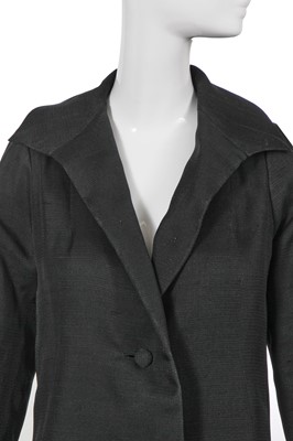Lot 391 - A Givenchy haute couture black silk gazar coat, Spring-Summer 1972