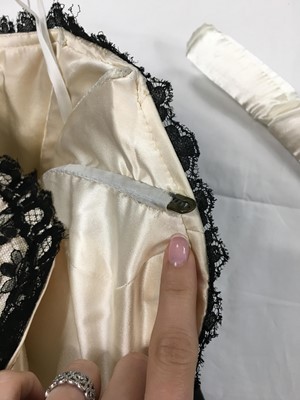 Lot 437 - A Hardy Amies black Chantilly lace and silk satin ballgown, circa 1956