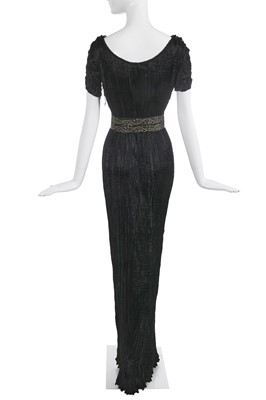 Lot 455 - A Mariano Fortuny black silk Delphos, circa 1920-30