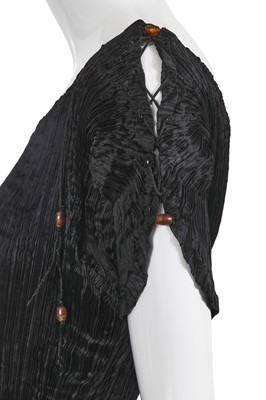 Lot 455 - A Mariano Fortuny black silk Delphos, circa 1920-30