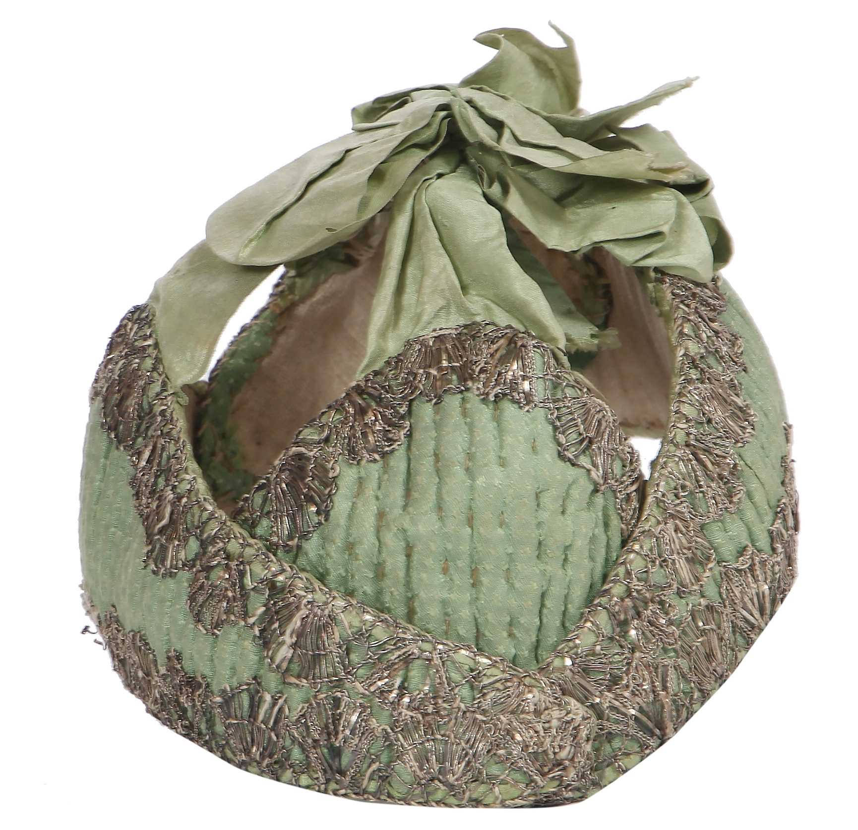 Lot 518 - A rare infant's pudding cap, second half of the 18th century