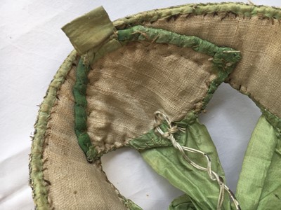 Lot 518 - A rare infant's pudding cap, second half of the 18th century
