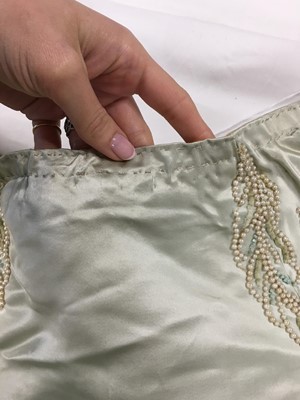 Lot 484 - A Charles Frederick Worth eau de nil satin evening gown, 1893-4