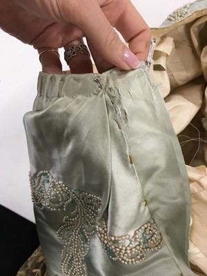Lot 484 - A Charles Frederick Worth eau de nil satin evening gown, 1893-4
