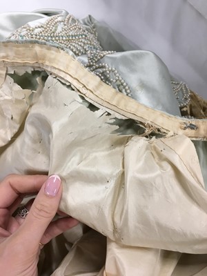 Lot 484 - A Charles Frederick Worth eau de nil satin evening gown, 1893-4