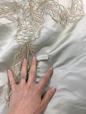 Lot 484 - A Charles Frederick Worth eau de nil satin evening gown, 1893-4