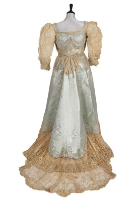 Lot 484 - A Charles Frederick Worth eau de nil satin evening gown, 1893-4
