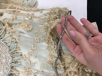 Lot 484 - A Charles Frederick Worth eau de nil satin evening gown, 1893-4