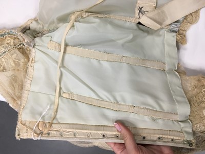 Lot 484 - A Charles Frederick Worth eau de nil satin evening gown, 1893-4