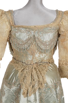 Lot 484 - A Charles Frederick Worth eau de nil satin evening gown, 1893-4