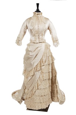 Lot 829 - A satin bridal gown, late 1880s