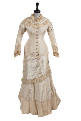 Lot 832 - An ivory silk faille bridal gown, circa 1880