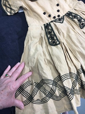 Lot 496 - Two buff nankeen cotton infant dresses, 1860s