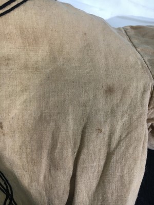 Lot 496 - Two buff nankeen cotton infant dresses, 1860s