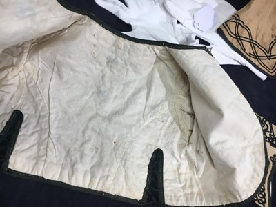 Lot 496 - Two buff nankeen cotton infant dresses, 1860s