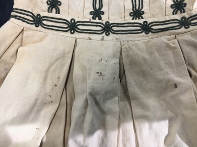 Lot 496 - Two buff nankeen cotton infant dresses, 1860s
