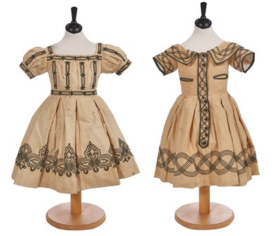 Lot 496 - Two buff nankeen cotton infant dresses, 1860s