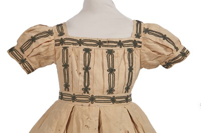 Lot 496 - Two buff nankeen cotton infant dresses, 1860s