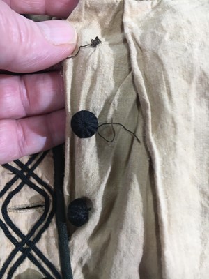 Lot 496 - Two buff nankeen cotton infant dresses, 1860s