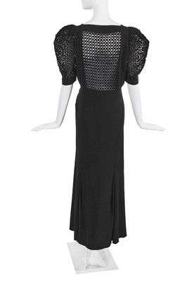 Lot 448 - A Nina Ricci black silk evening dress, late 1930s