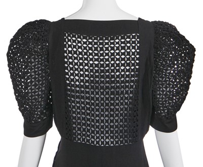 Lot 448 - A Nina Ricci black silk evening dress, late 1930s