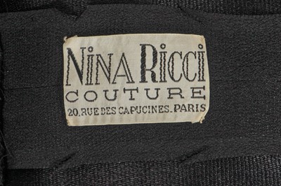 Lot 448 - A Nina Ricci black silk evening dress, late 1930s