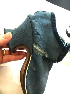Lot 536 - A pair of blue wool damask shoes, circa 1720