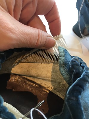 Lot 536 - A pair of blue wool damask shoes, circa 1720