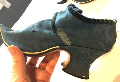 Lot 536 - A pair of blue wool damask shoes, circa 1720