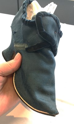 Lot 536 - A pair of blue wool damask shoes, circa 1720