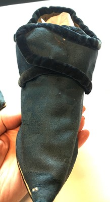 Lot 536 - A pair of blue wool damask shoes, circa 1720