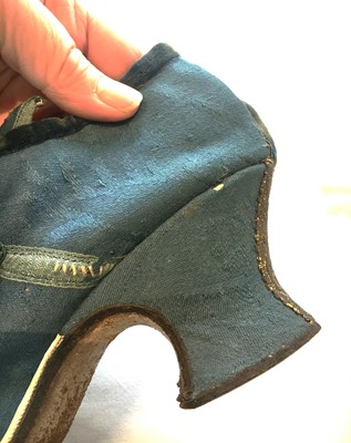Lot 536 - A pair of blue wool damask shoes, circa 1720
