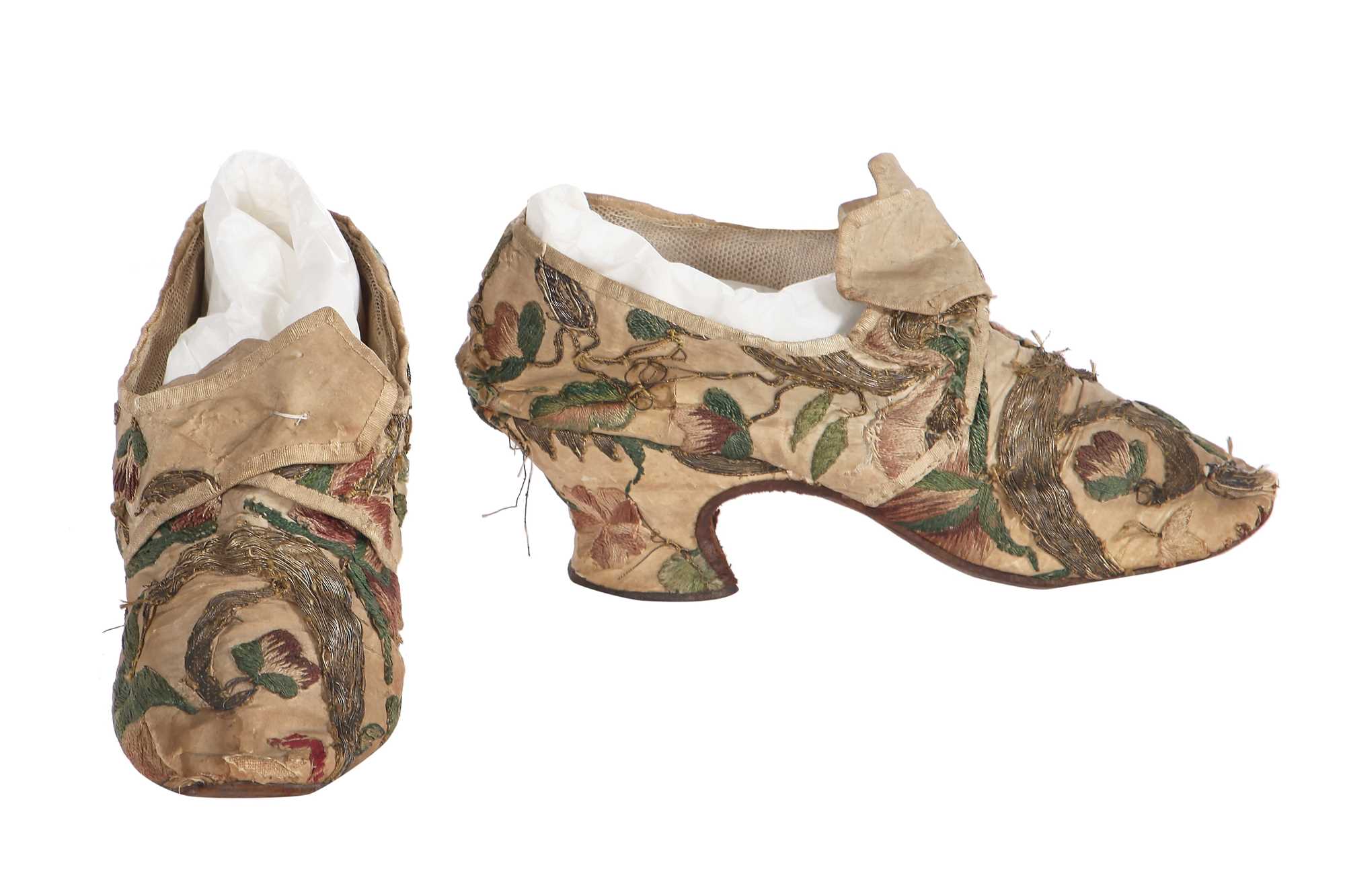 Lot 530 - A pair of embroidered ecru silk shoes 1760-70