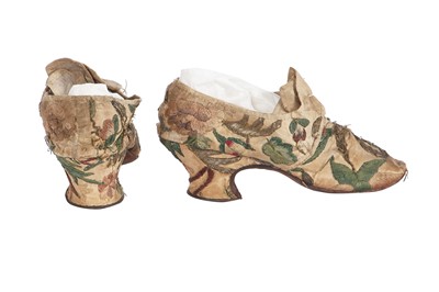 Lot 530 - A pair of embroidered ecru silk shoes 1760-70