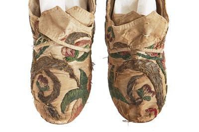 Lot 530 - A pair of embroidered ecru silk shoes 1760-70