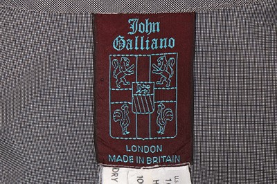 Lot 107 - Two John Galliano Prince of Wales checked wool...