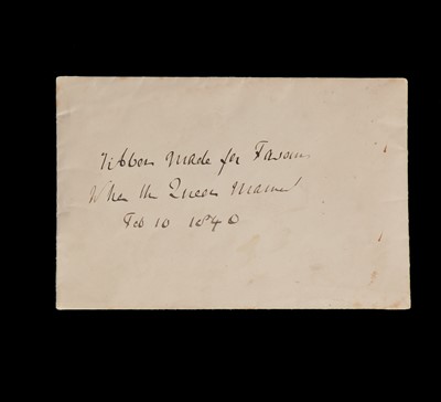 Lot 867 - An ivory satin ribbon probably woven to commemorate the wedding of Queen Victoria in 1840