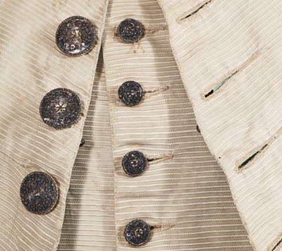 Lot 184 - A pale grey silk tailcoat, probably French, 1770s