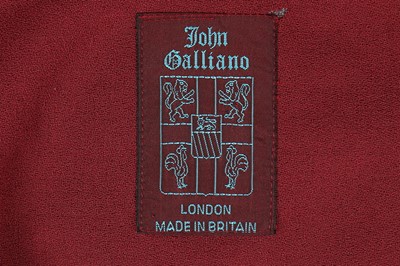Lot 108 - A John Galliano brown moss crepe tunic dress,...