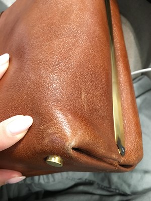 Lot 243 - An Alexander McQueen brown leather handbag, 2010s