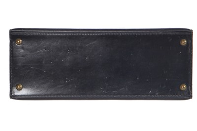 Lot 47 - An Hermès black leather 'Model 404' handbag, early 1960s