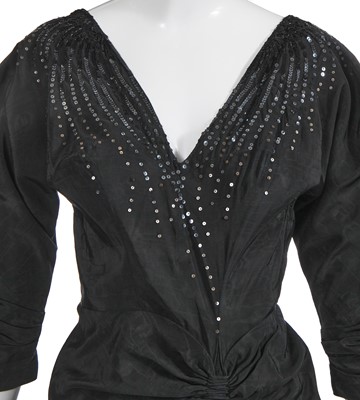 Lot 443 - A Maggy Rouff haute couture black moiré evening dress, late 1940s