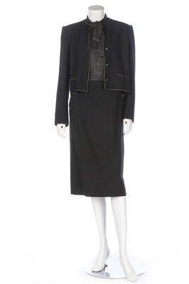 Lot 199 - A Chanel Créations black wool-blend suit,...